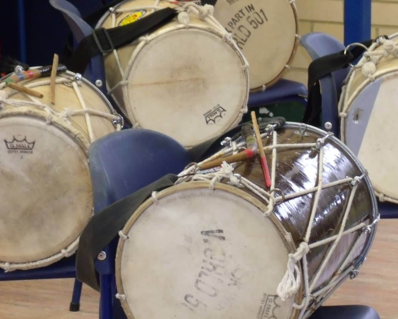 Selection of Indian drums on school chairs