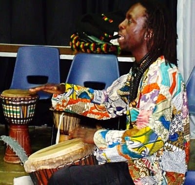 African man drumming