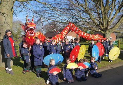 group of people chinese dragon dancing