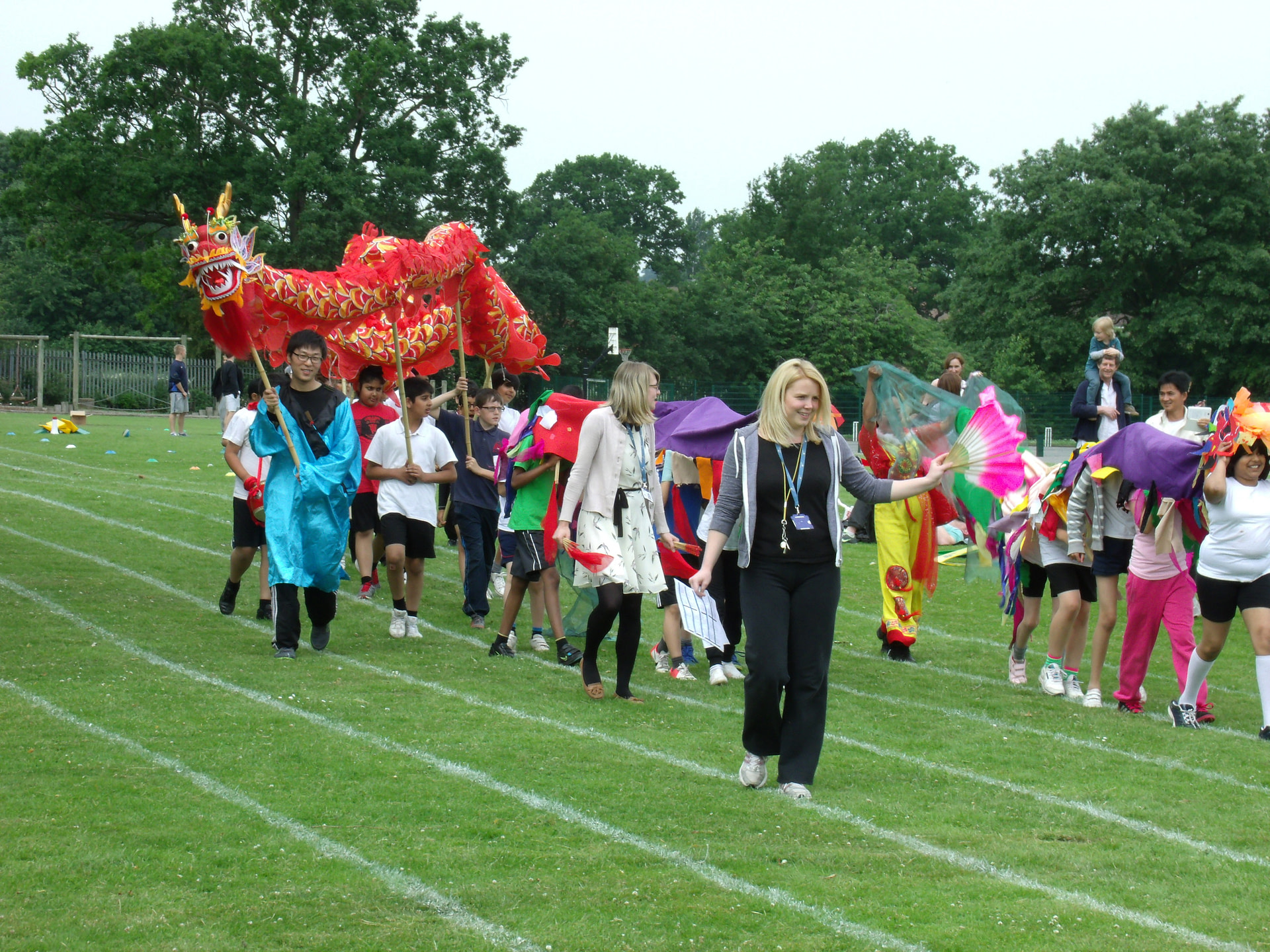 Chinese dragon dancing on school playing field