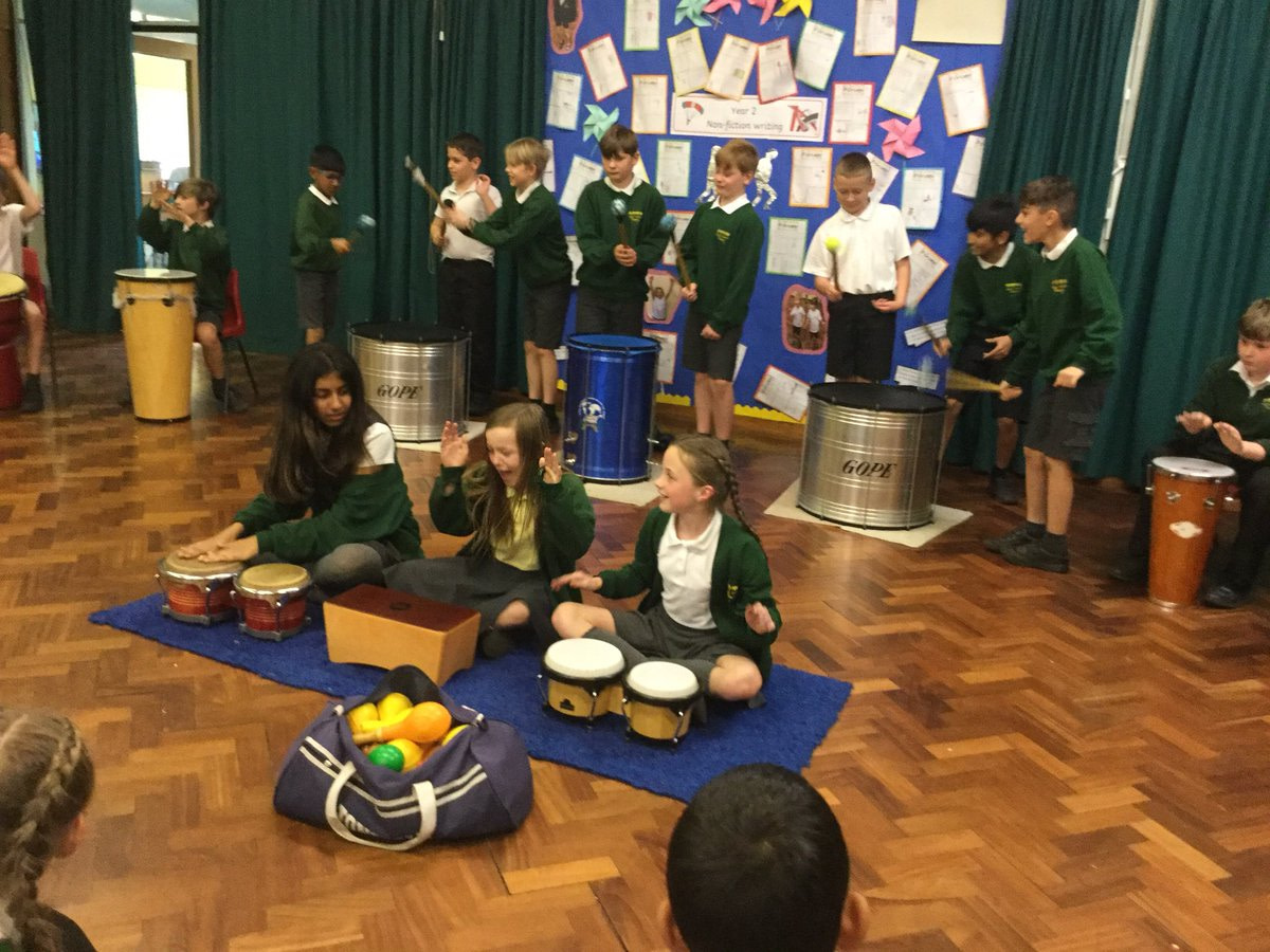 School children playing Samba drums together