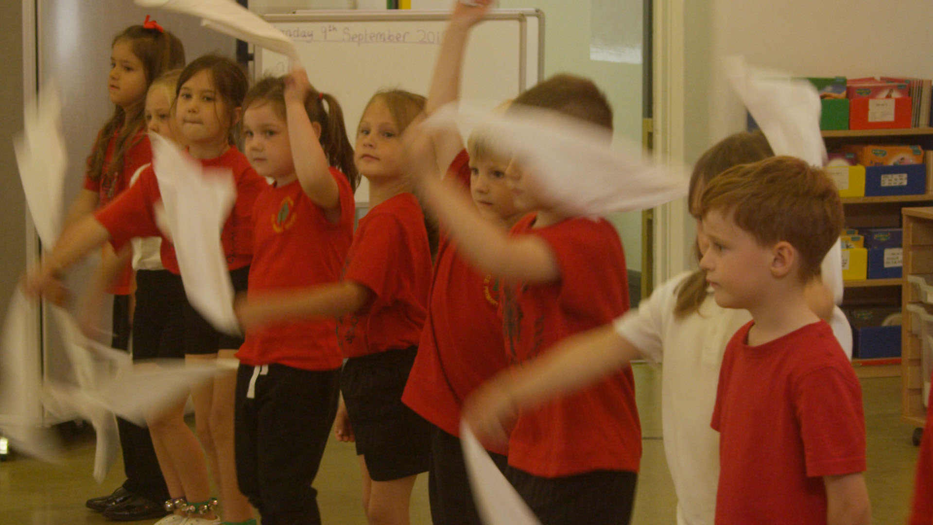 School children performing morris dancing