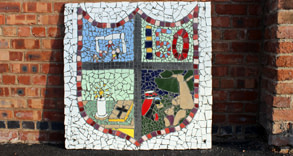 Colourful mosaic showing a school badge