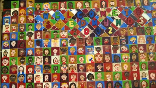 Colourful mosaic featuring each pupils face